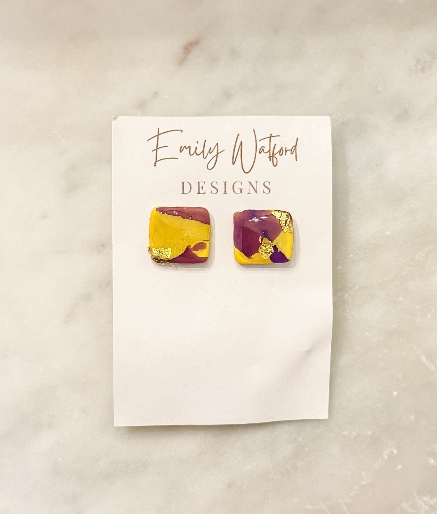 Purple and gold stud