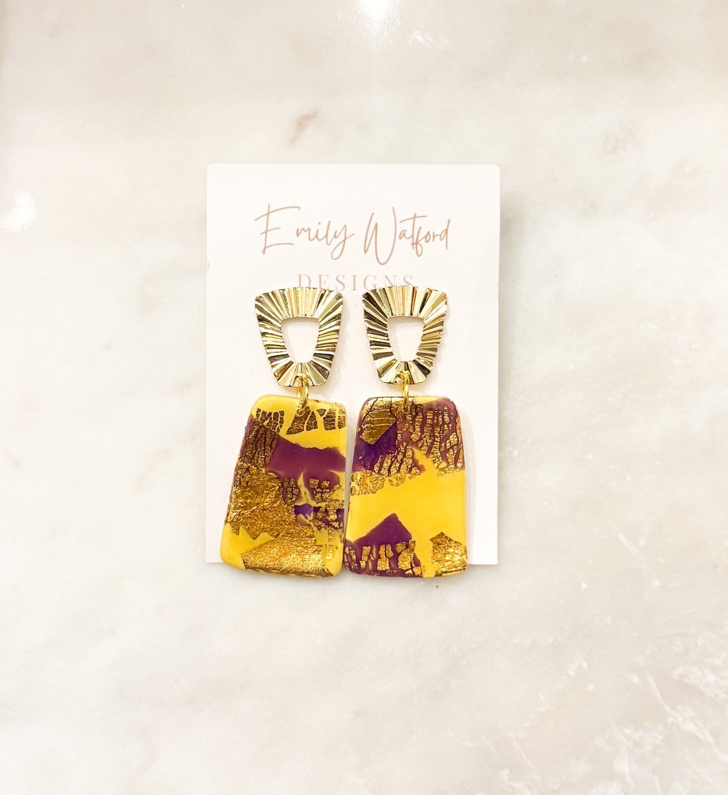 Purple and gold dangle