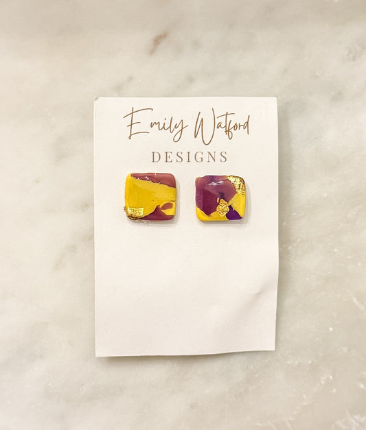 Purple and gold stud